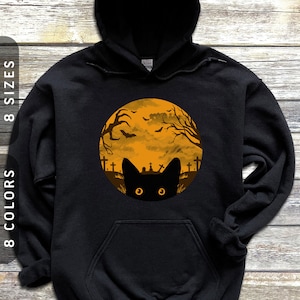Peeking Cat on Halloween Night Hoodie | Unisex Hooded Sweatshirt | Cat Mom and Dad Hoodie | Spooky Season Hoodie | Black Cat Pullover Hoodie