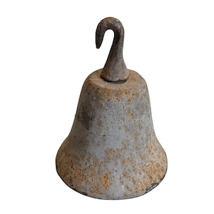 May include: A weathered, bell-shaped metal object with a curved hook at the top. The bell has a textured, grey surface with patches of rust-coloured discolouration. The hook is also made of metal and shows signs of age.