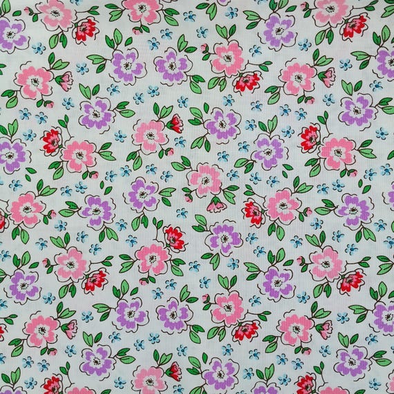 20s/30s Feedsack repro Depression fabric Mon Beau Jardin by Nadra Ridgeway. 100% cotton, pink/lilac/red flowers on white. Sold by the yard.
