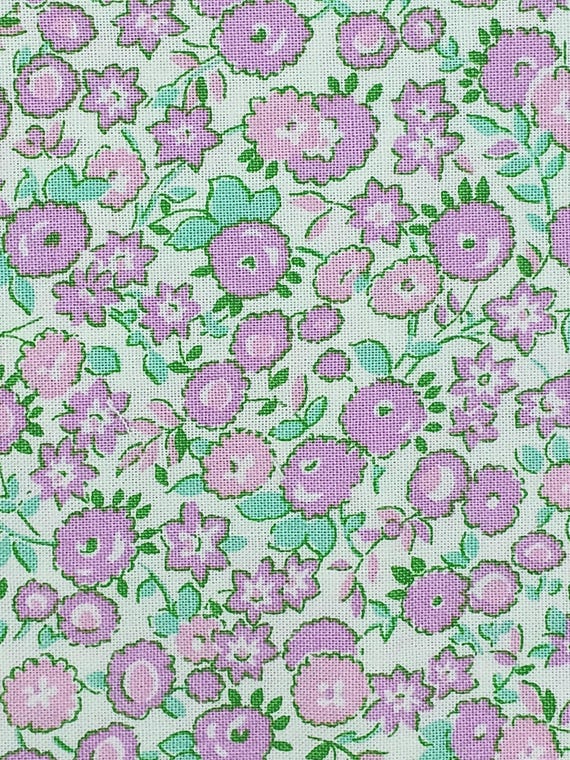 20s/30s Feedsack Depression fabric Everything but the Kitchen Sink by RJR Studio. 100% cotton, pink/lilac flowers on white Sold by the yard.