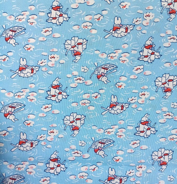 Depression 20s 30s feedsack print 100% cotton RJR Studio E.B.T.K.S XV. Blue Bunny in boat.  Sold by the yard.