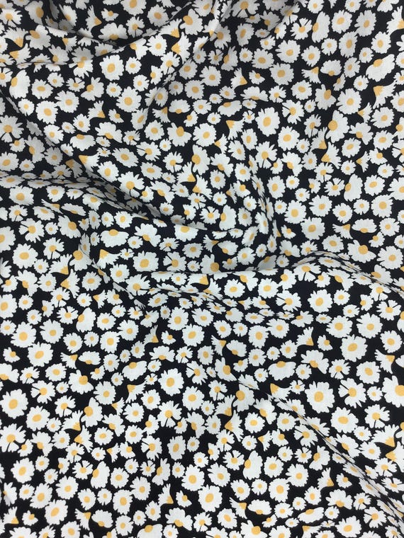 Depression 20s 30s feedsack print 100% cotton. Poppie Cotton “Hopscotch & Freckles” black background with white daisys. Sold by the yard.