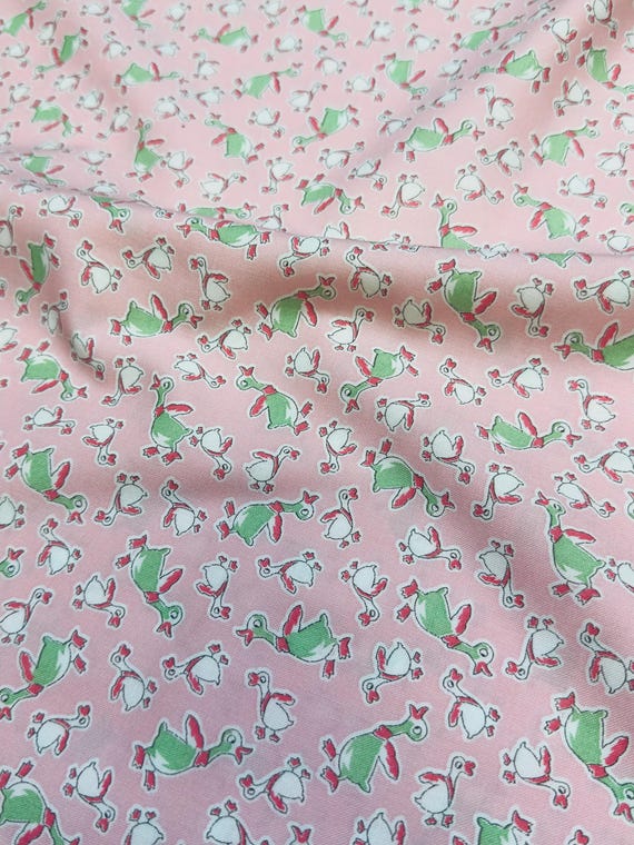 Depression 20s 30s feedsack print 100% cotton RJR Studio Everything but the kitchen sink “Duck Dance” Pink. Sold by the yard.