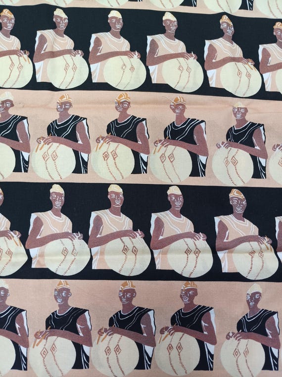 Drummer Men black and tan background, Dayo African Collection 100% Cotton Sold by the yard