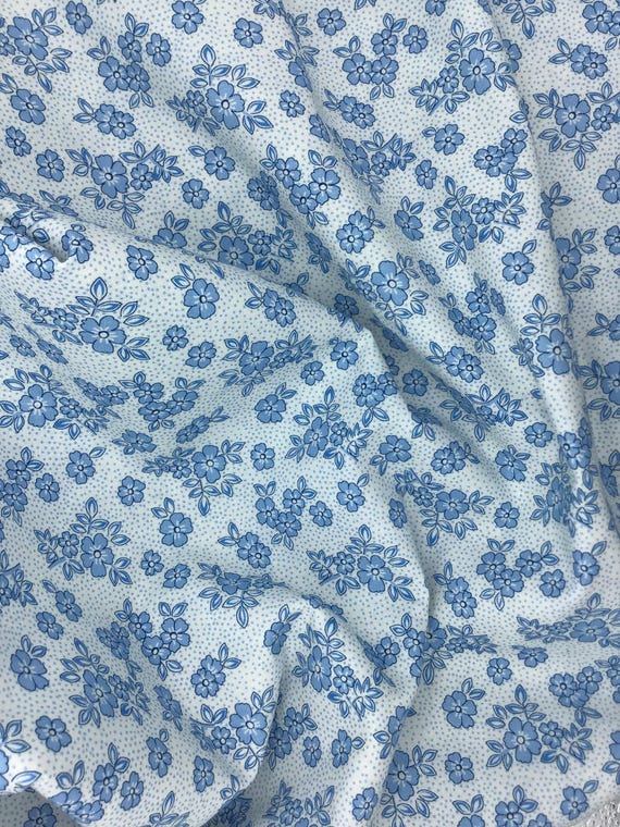 Depression 20s 30s feedsack print 100% cotton fabric. Flowerhouse At the Cottage by Debbie Beaves. Blue flowers on white. Sold by the yard