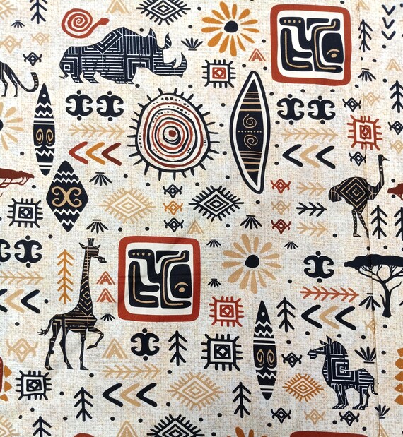 Tribal tan background, African print by QT Fabrics 100% Cotton Sold by the yard