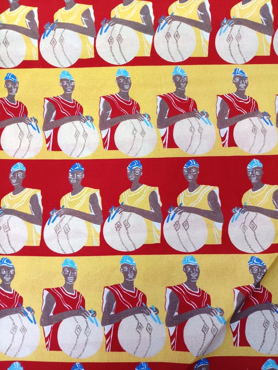Drummer Men red and yellow background, Dayo African Collection 100% Cotton Sold by the yard