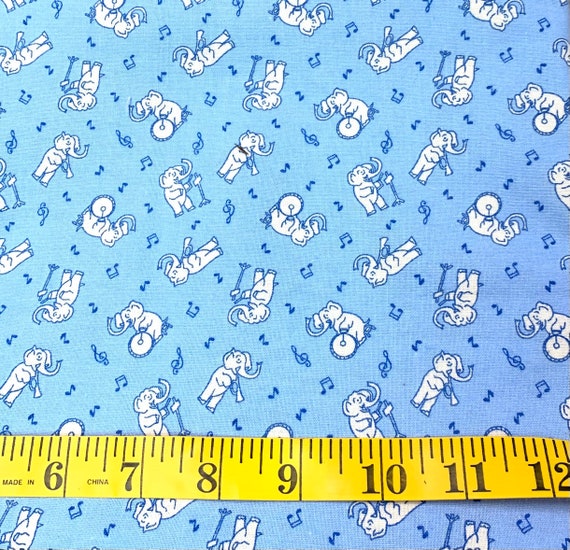 Depression 20s 30s feedsack print 100% cotton fabric. Nana Mae 6 by Henry Glass White Elephants on Blue background. Sold by the yard.
