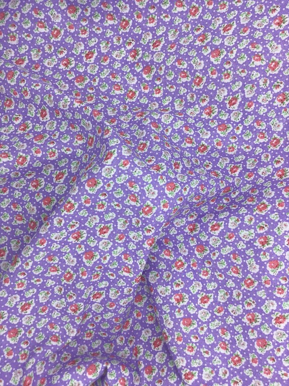 Depression 20s 30s Feedsack print. 100% cotton fabric. Pink/white flowers on purple background. Sold by the yard