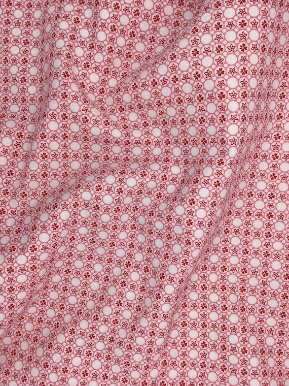Depression 20s 30s feedsack print 100% cotton RJR Studio Everything but the kitchen sink pink geometric flowers “dotty” . Sold by the yard.