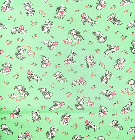 Depression 20s 30s feedsack print 100% cotton RJR Studio Everything but the kitchen sink. Playful Puppies on green. Sold by the yard.