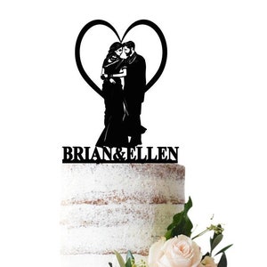 Wedding cake topper with Indian bride and groom