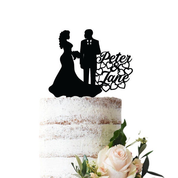 Wedding cake topper with an Afro-American /African bride and groom.