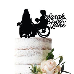 Wedding cake topper Two brides in wheelchairs