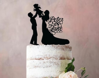 Wedding cake topper Bride and groom holding toddler Option for girl or boy toddler