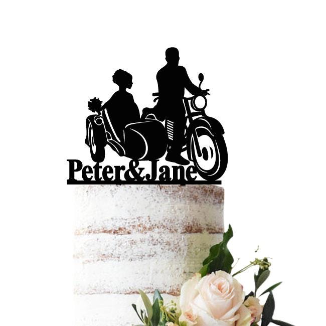Wedding cake topper Bride and groom on a motor with sidecar