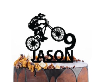 Birthday cake topper with a mountain bike cyclist