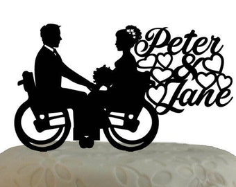 Wedding cake topper bride and groom in wheelchair