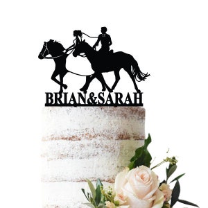 Wedding cake topper Horse riding bride and groom