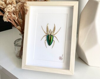 Haute couture insect embroidery in frame
