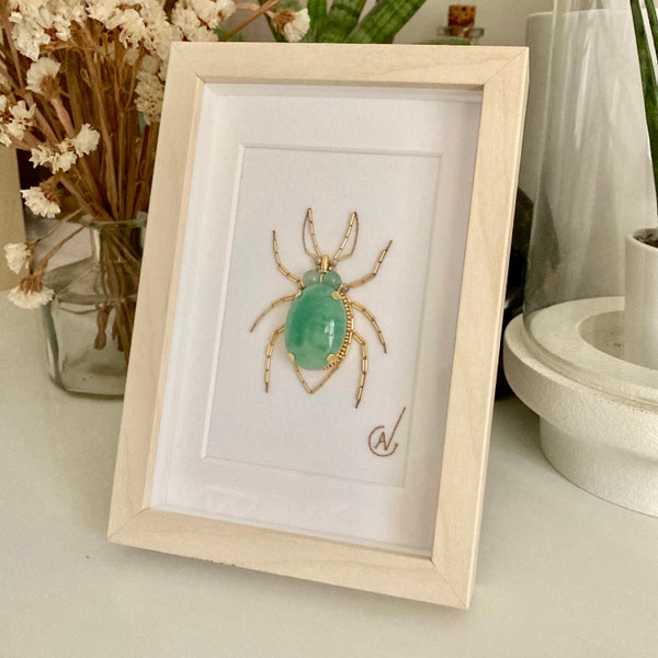 Haute couture insect embroidery in frame