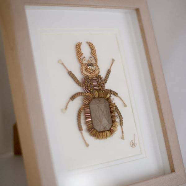 Embroidery Haute Couture insect in framework