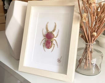 High-fashion insect embroidery in a frame