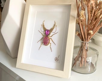 High-fashion insect embroidery in a frame