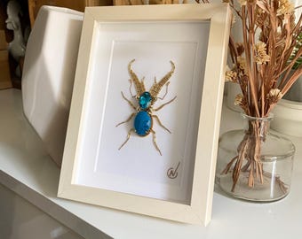Haute Couture insect embroidery in frame