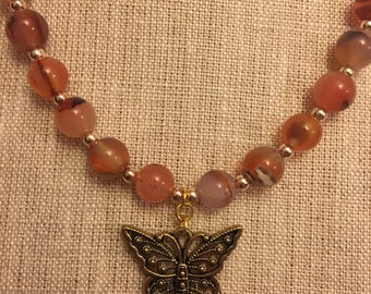 Pink and gold butterfly necklace