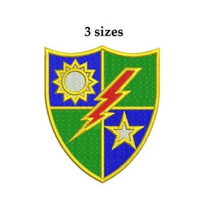 May include: A green, blue, and gold embroidered patch with a red lightning bolt, a white star, and a yellow sun with a white center. The patch is shaped like a shield and has the text "3 sizes" above it.