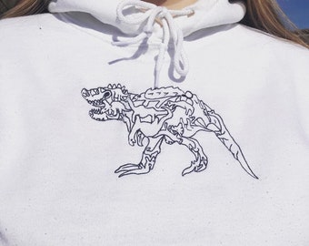 Embroidered T-Rex Dinosaur Hoodie - monochrome T-Rex line drawing on hooded sweatshirt. The perfect gift for dinosaur or animal lovers