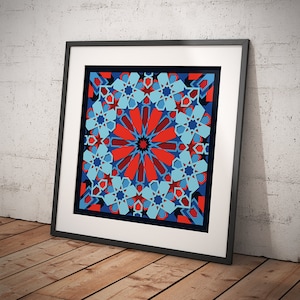 May include: Framed artwork featuring a geometric pattern in shades of blue, red, and black. The design is reminiscent of traditional Islamic art.