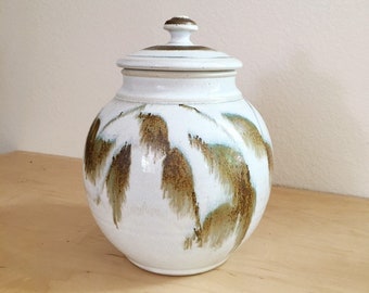 multi colored ceramic jar with decorative cut rim Deep blue