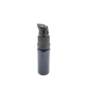 May include: A small, dark blue glass bottle with a black pump top. The bottle is designed for dispensing liquids.
