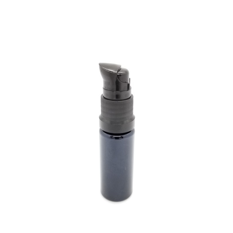 May include: A small, dark blue glass bottle with a black pump top. The bottle is designed for dispensing liquids.