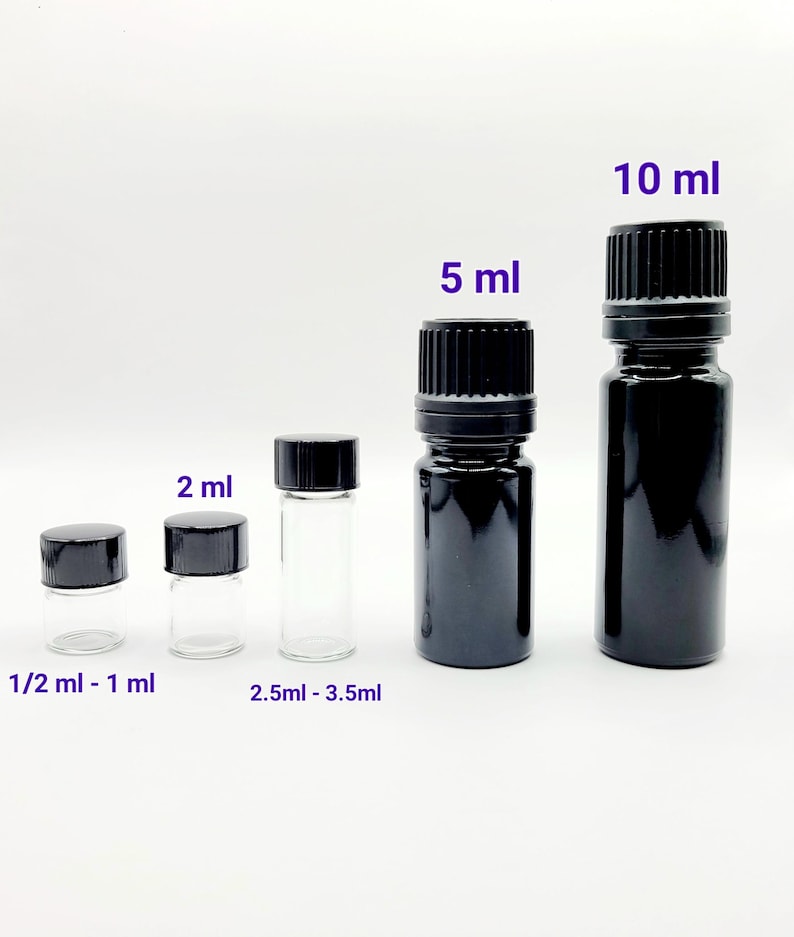 May include: Five glass bottles with black caps, ranging in size from 1/2 ml to 10 ml. The bottles are arranged from smallest to largest. The bottles are labeled with their respective sizes in milliliters.
