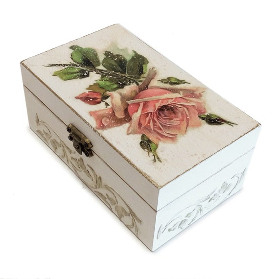 A cute pink hand painted wooden box with lid