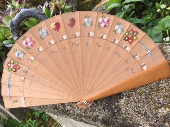 Beautiful fan thin hand-painted wooden strips from