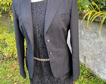 veste noire rayures tennis
