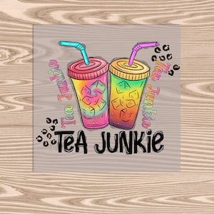 May include: Colorful graphic of two iced tea cups with straws, featuring rainbow gradients and ice cubes. The text "Tea Junkie" is displayed in a playful font, with leopard print accents. The design is on a light gray background.