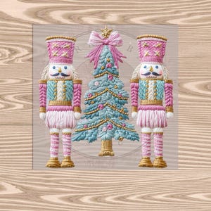 May include: An illustration of two pink and gold nutcrackers flanking a blue Christmas tree with gold garland and a pink bow. The nutcrackers have pink hats, blue jackets, and white skirts. The background is a light wood grain.