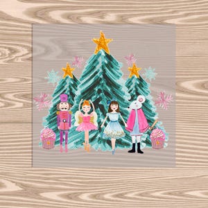 May include: A watercolor painting of a Nutcracker, two ballerinas, and a mouse standing in front of three Christmas trees. The trees are decorated with pink and blue ornaments and stars. The ballerinas are wearing pink and blue tutus and the Nutcracker is wearing a red and gold uniform.
