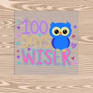 May include: A colorful graphic with the text "100 DAYS WISER" and a blue owl illustration. The design includes hearts and stars in various colors, perfect for celebrating a milestone in education.