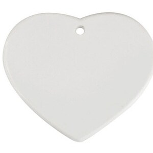 May include: White ceramic heart-shaped ornament with a hole at the top for hanging.