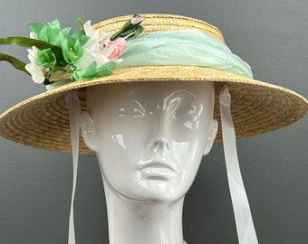 Straw boater or "shepherdess" style hat with vintage flowers