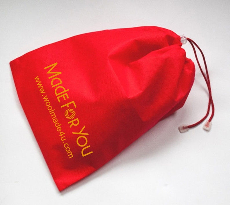 Made For You shoe bag in red or off-white color is included with each pair. It is made out of recycled cotton fibers.