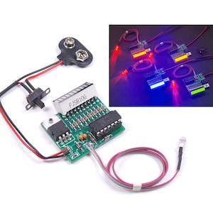 Könnte beinhalten: Ein elektronisches Leiterplattenmodul mit einer zehnsegmentigen LED-Balkenanzeige mit der Aufschrift FJSB10G, einem Schiebeschalter, einem 9V-Batterieanschluss und einer einzelnen klaren LED an einem Kabel. Der Einschub zeigt vier Module in Rot, Gelb, Blau und Grün.