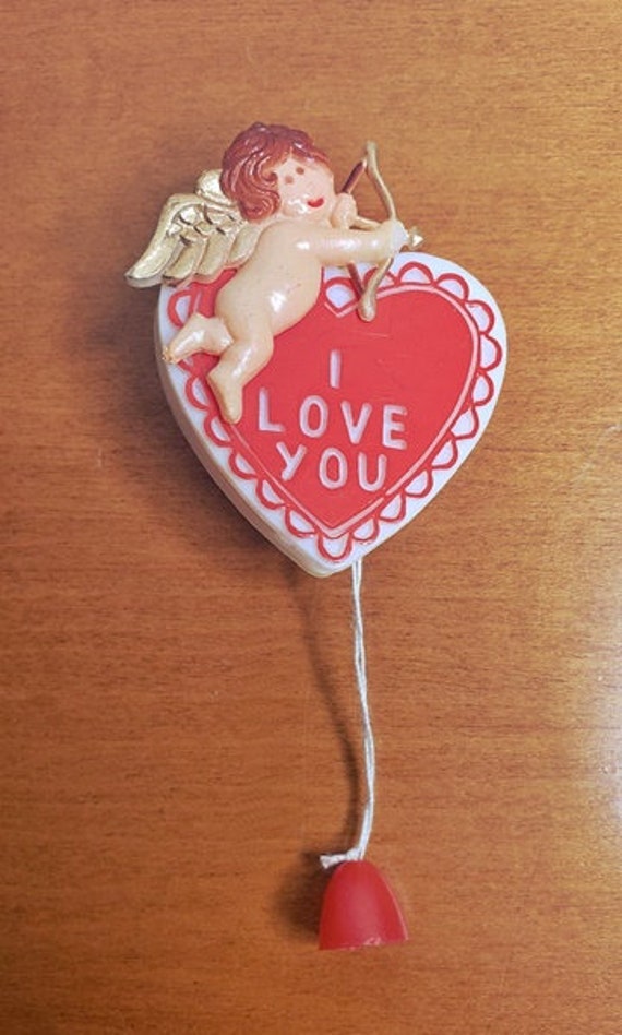 Early Plastic Articulating Valentine Brooch