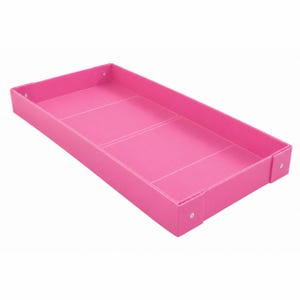 May include: A rectangular hot pink tray with a smooth surface and raised edges. The tray features visible white stitching along the seams and corners, with small silver-toned metal rivets securing the corners of the structure for added stability.